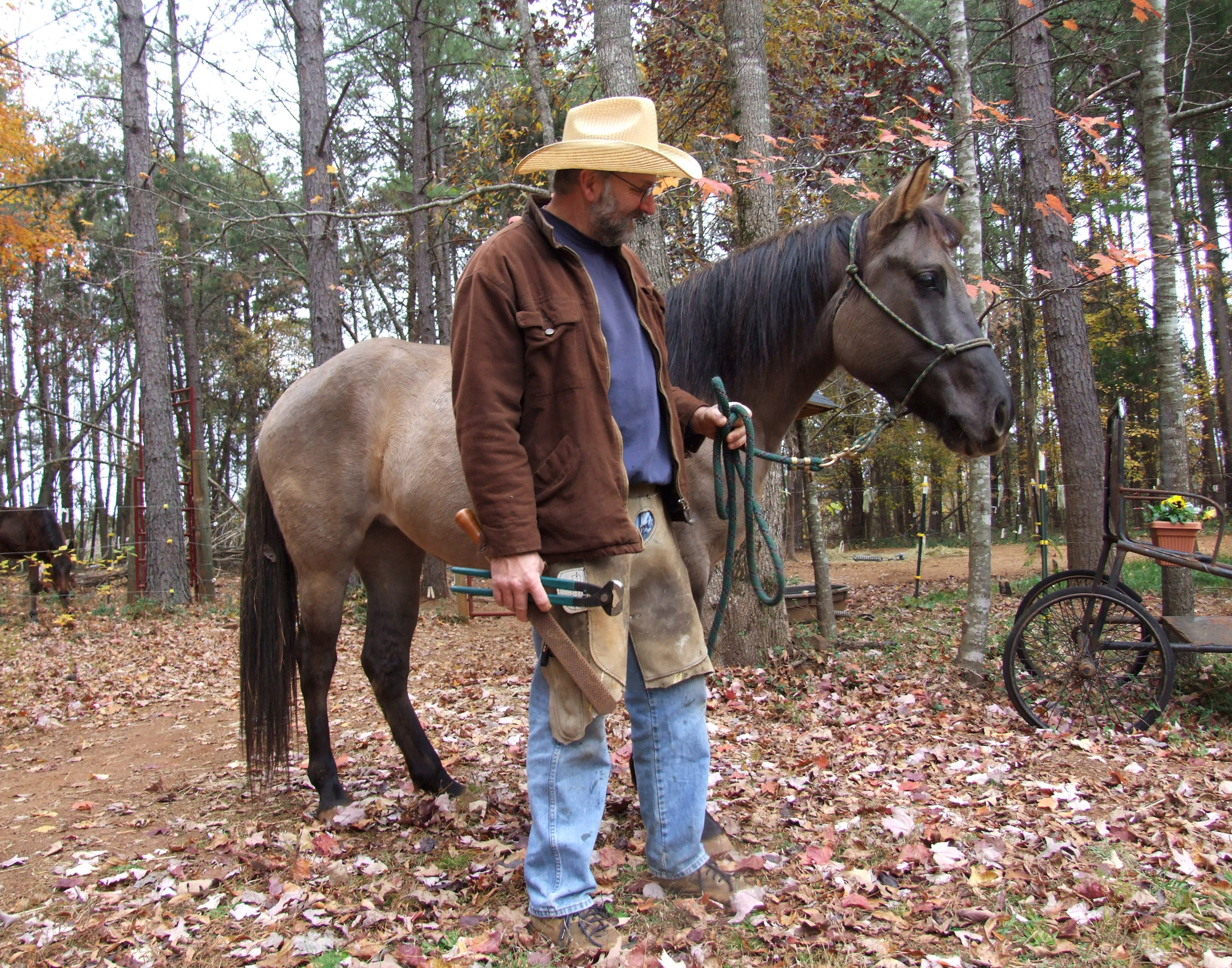 Beranger’s husband, Fred, with Moon, an endangered Marsh Tacky horse.