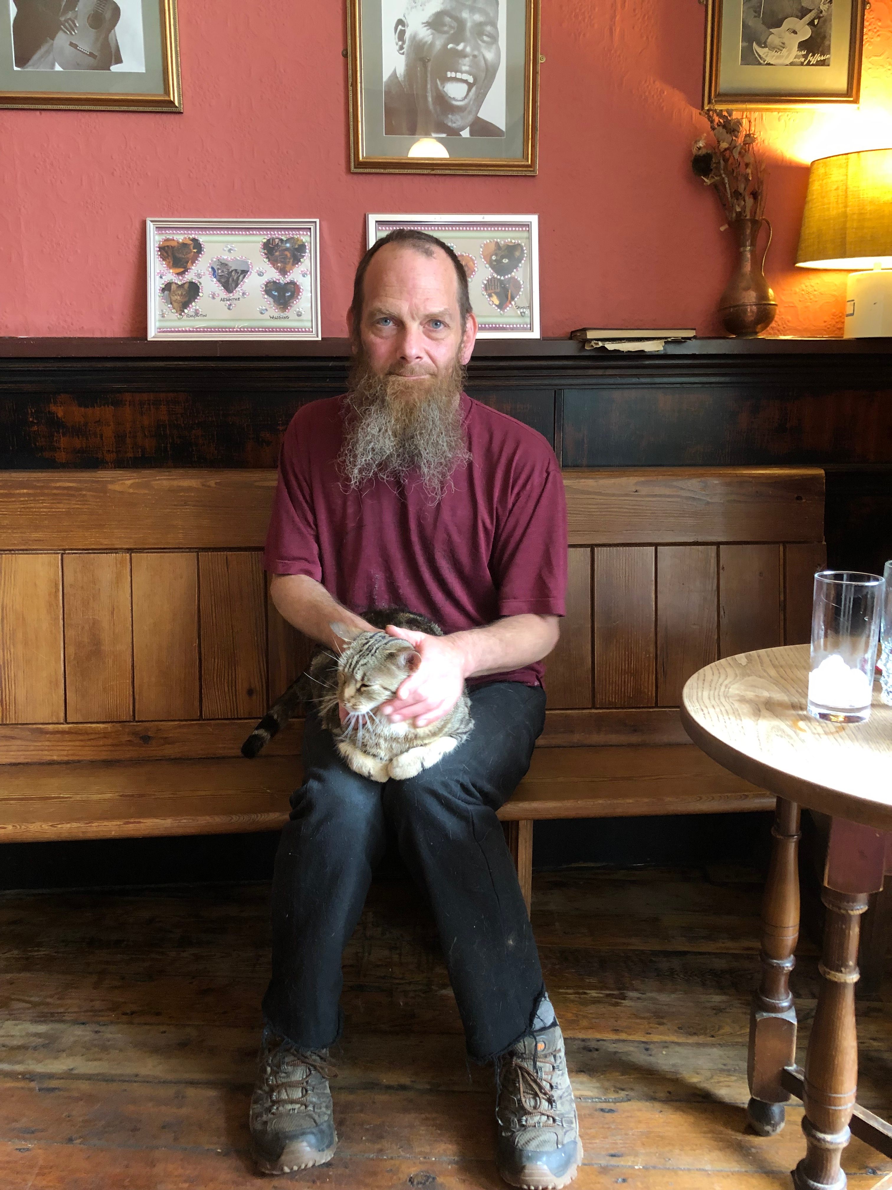 Luke Daniels and one of his (many) cats.