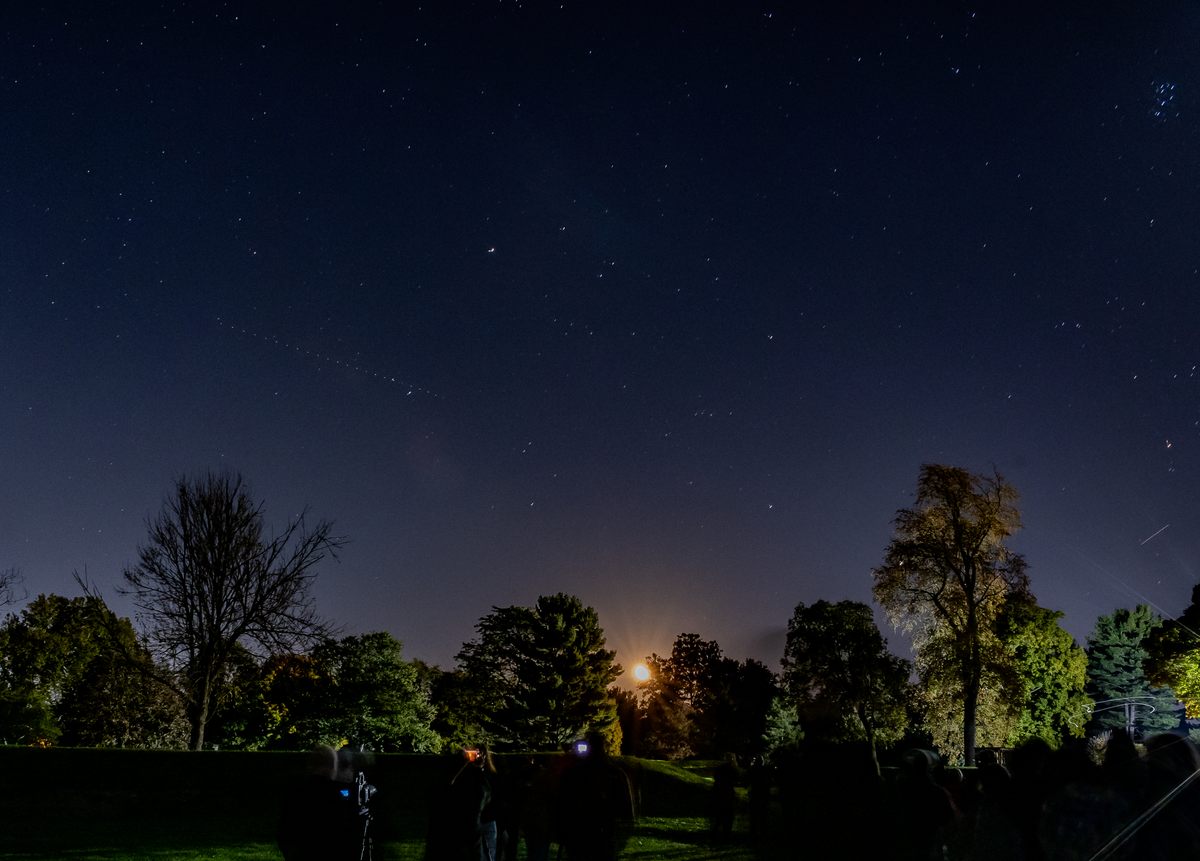The Moon rises over Octagon Earthworks. Built more than 2,000 years ago, this structure aligns with the 18.6-year lunar cycle.
